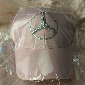 This Mercedes Benz cap is the real deal. This cap belongs to a Boss with a Benz